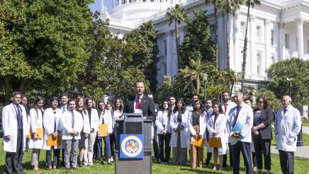 Photo of Asm. Haney speaking at AB371 Dental Coverage Press Conference