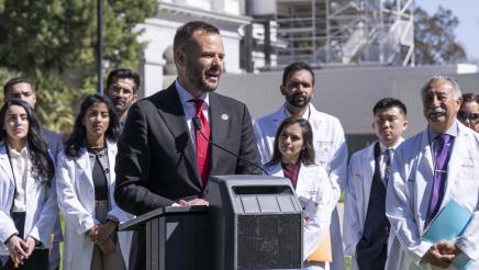 Photo of Asm. Haney and advocates speaking at AB371 Dental Coverage Press Conference