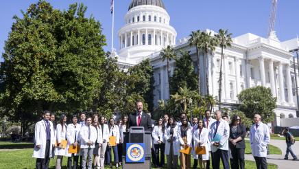 Photo of Asm. Haney and advocates speaking at AB371 Dental Coverage Press Conference