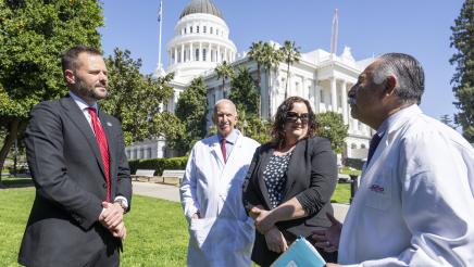 Photo of Asm. Haney and advocates speaking at AB371 Dental Coverage Press Conference