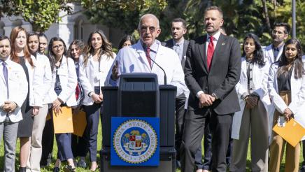 Photo of Stuart Bussey, of Union of America Physicians and Dentists, at Asm. Haney AB371 Dental Coverage Press Conference
