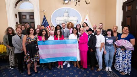 Group photo speaking Trans Month Presser