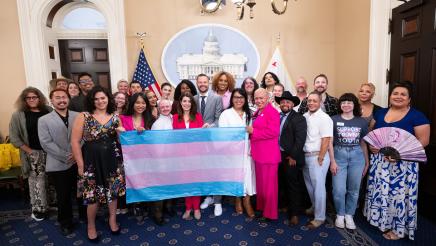 Group photo speaking Trans Month Presser